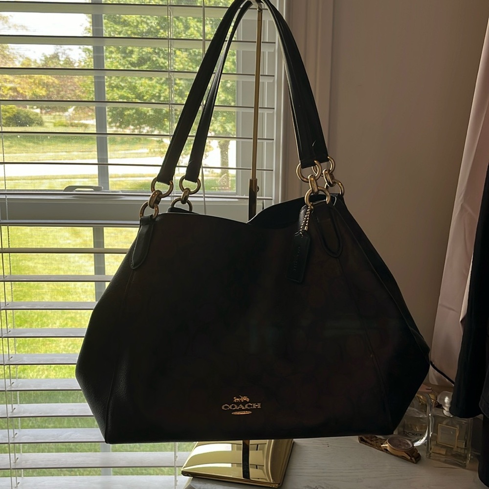 Brown and black Coach ladies bag